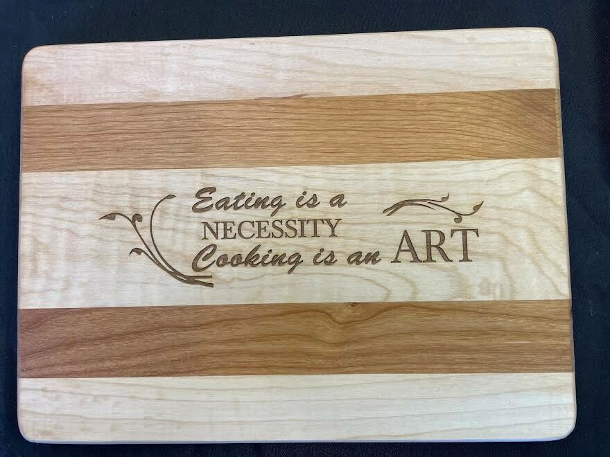 J and J Cutting Board Eating is a necessity